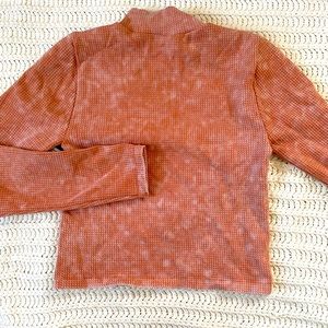 Rest colored waffle weave mock turtleneck.